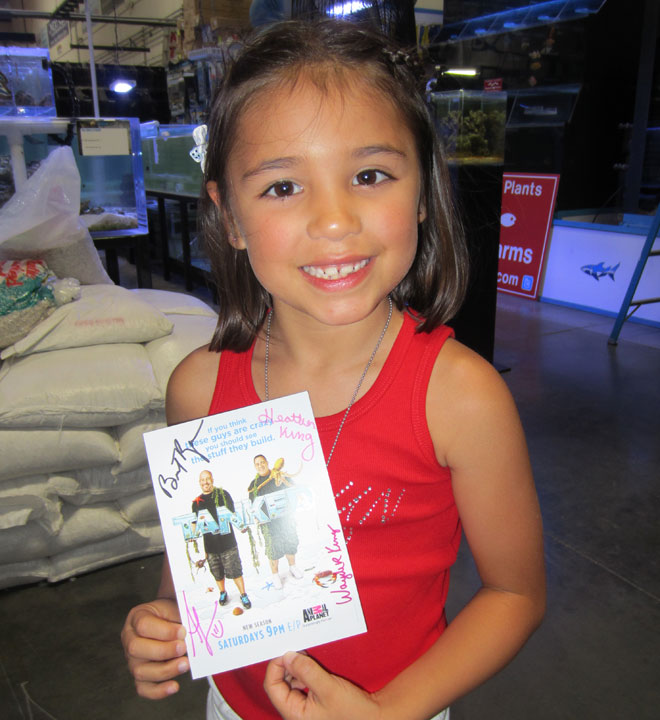 Madi with a Las Vegas reality show Tanked autographed postcard