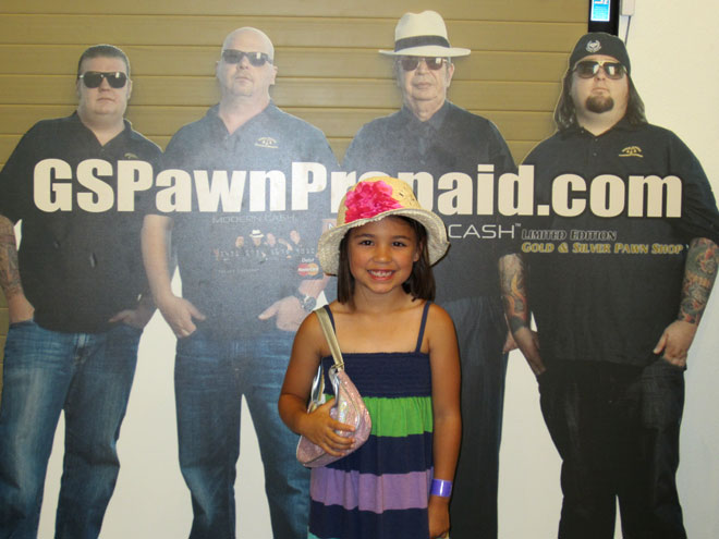 Madison posing at the Gold & Silver Pawn Shop