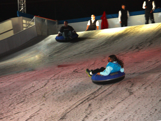 Tubing Down the Glacier Glide Ice Slope