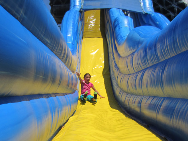 Sliding down the huge slide