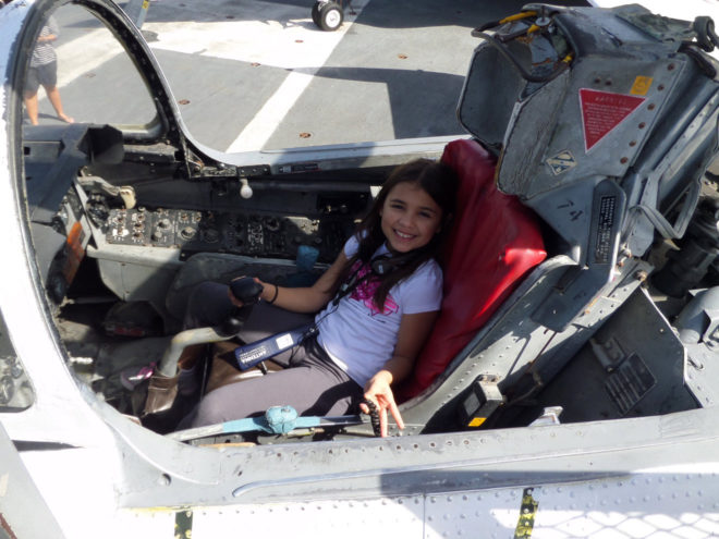 Madi in the cockpit of a T-2 Buckeye
