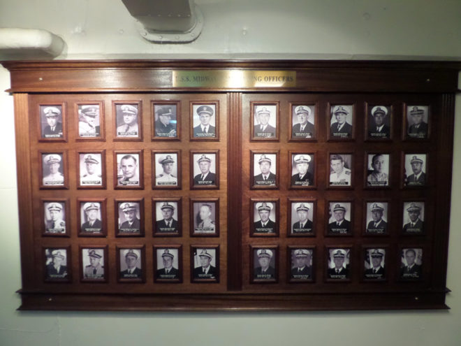 A plaque of commanding officers of the USS Midway Aircraft Carrier