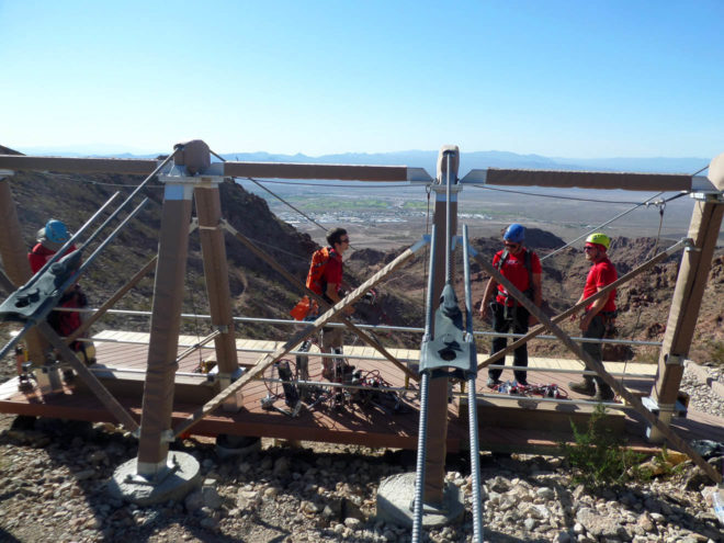 Flightlinez staff prepares the zipline run