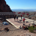 Zipline riders exiting the landing area