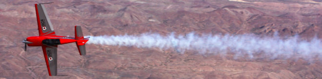 Sky Combat Ace plane flying over the Las Vegas desert
