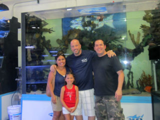 Tanked TV show star Brett Raymer posing with my family