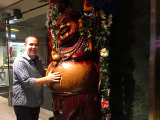 Rubbing Buddah's Belly at the California Hotel and Casino in Downtown Las Vegas