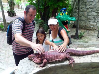 Touching a Lizard at Croco Cun Zoo